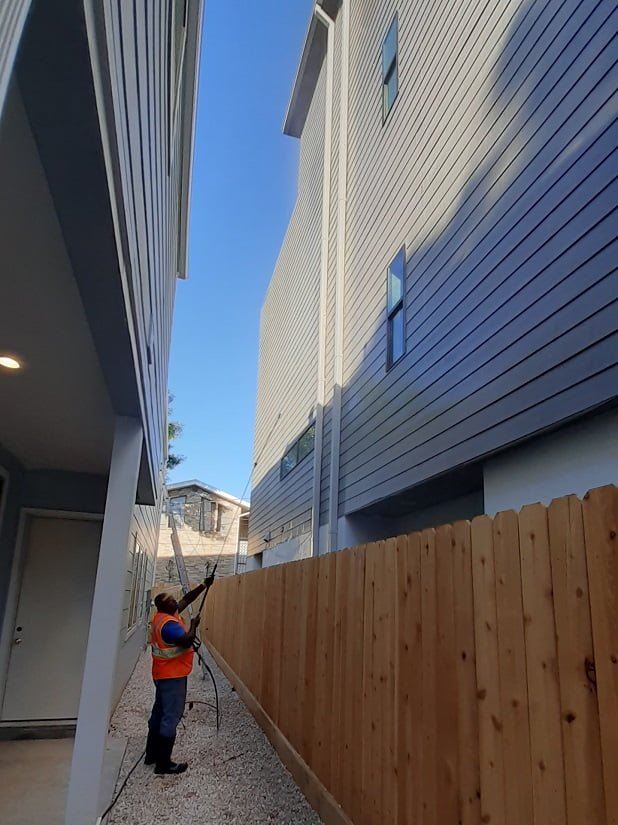 4-story building before washing by LKJ Preferred Services, Houston TX