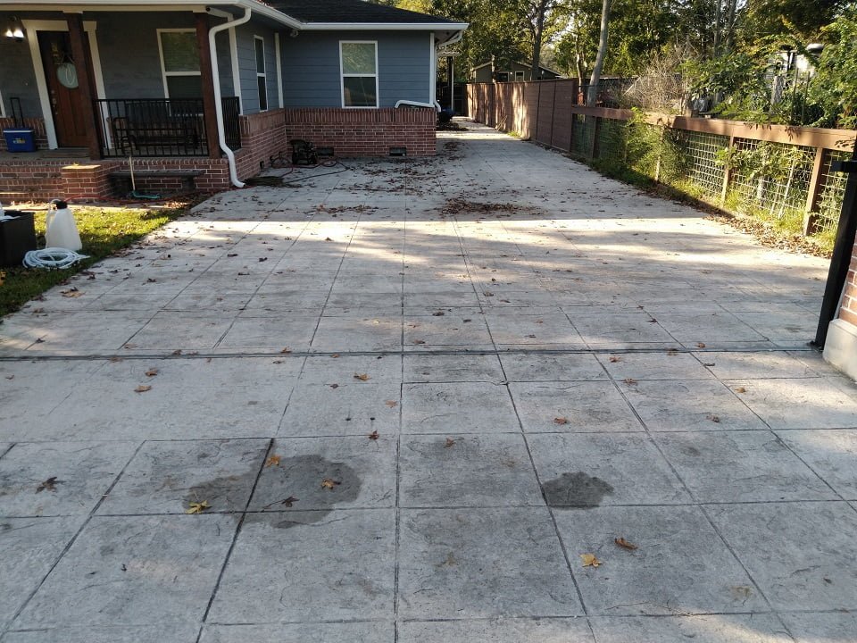 Driveway before pressure washing by LKJ Preferred Services, Houston TX