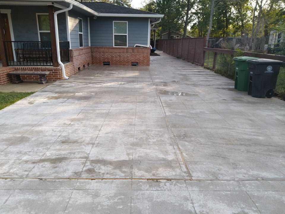 Driveway after pressure washing by LKJ Preferred Services, Houston TX