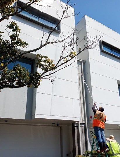 4-story building washed with no lifts or scaffolding by LKJ Preferred Services, Houston TX
