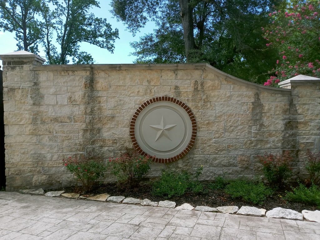 Outer limestone wall before cleaning by LKJ Preferred Services, Houston TX