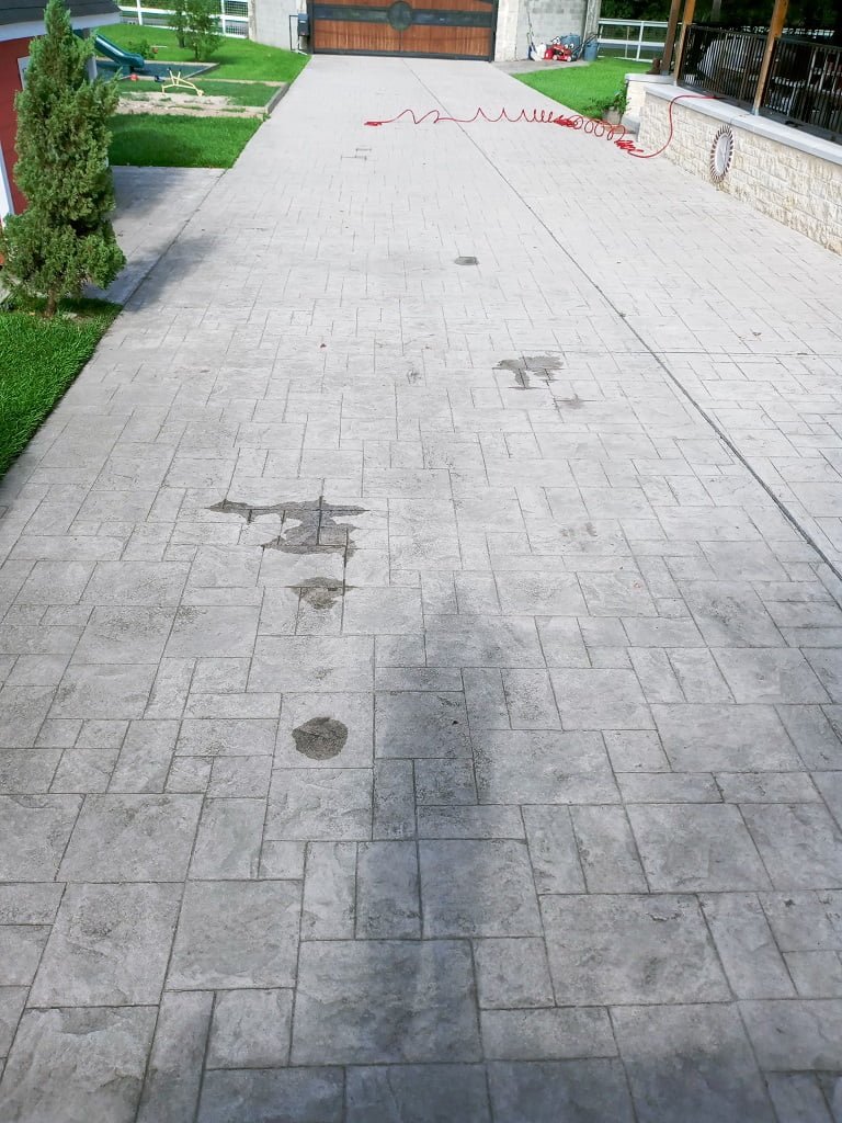 Stone driveway before cleaning by LKJ Preferred Services, Houston TX