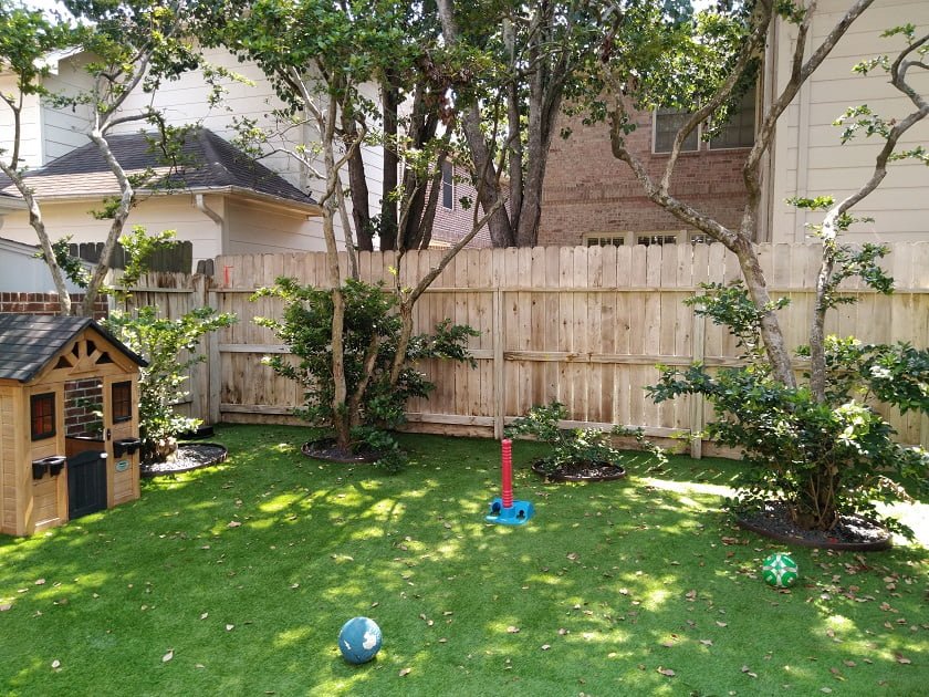 Picket fence treated and cleaned, looking new again, by LKJ Preferred Services, Houston TX