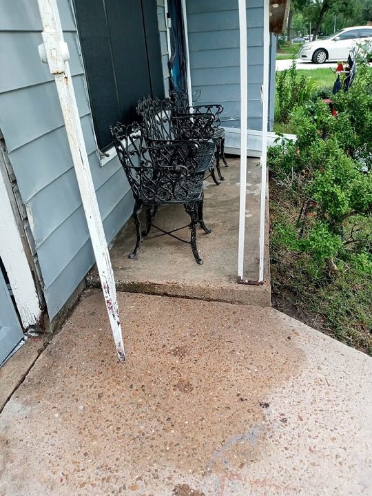 Driveway after rust and tar removed by LKJ Preferred Services, Houston TX