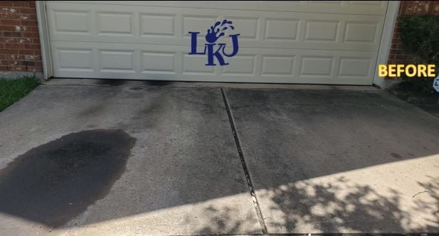 Large oil stain before removal by LKJ Preferred Services, Houston TX